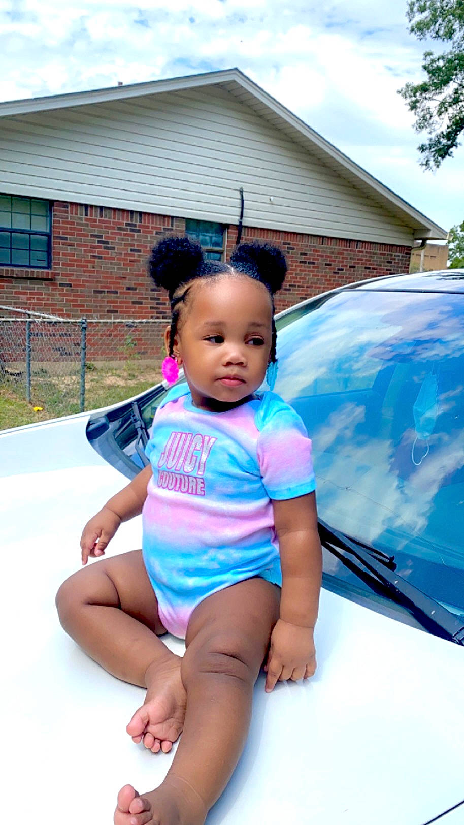 Khatoriyah joined the competition — help win amazing prizes! automotive_exterior, baby, baby_toddler_clothing, blue, bumper, child, electric_blue, fun, grass, happy, hood, leisure, person, recreation, sandal, shorts, sitting, sky, t_shirt, thigh