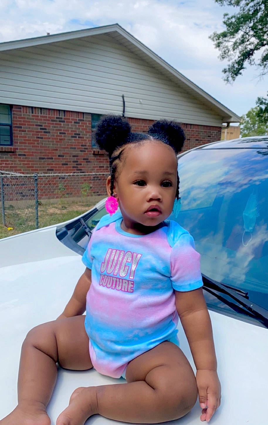 Khatoriyah joined the competition — help win amazing prizes! automotive_exterior, baby_toddler_clothing, child, electric_blue, family_car, fun, grass, happy, hood, human_leg, leisure, person, plant, recreation, sitting, sky, t_shirt, thigh, toddler, tree