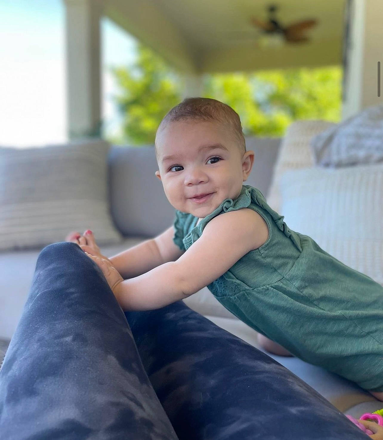 Malaysia is registered to the contest to win money with this photo: baby, baby_toddler_clothing, child, comfort, flash_photography, floor, flooring, fun, happy, human_leg, joy, leisure, linens, person, room, sitting, skin, sleeve, smile, t_shirt