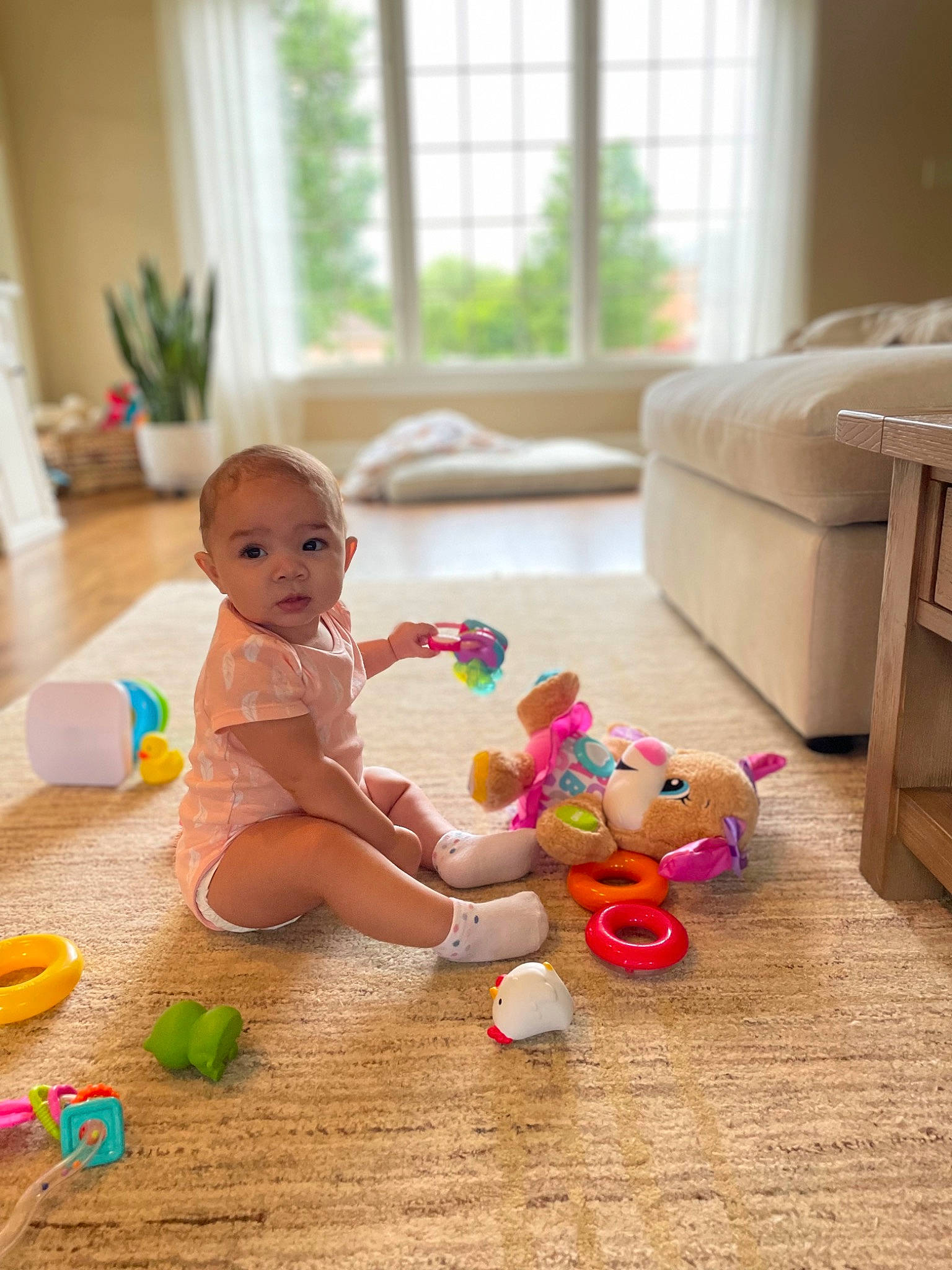 Malaysia joined the competition — help win amazing prizes! baby, baby_playing_with_toys, child, floor, flooring, fun, happy, hardwood, houseplant, leg, leisure, person, plant, room, smile, stuffed_toy, toddler, toy, window, window_blind