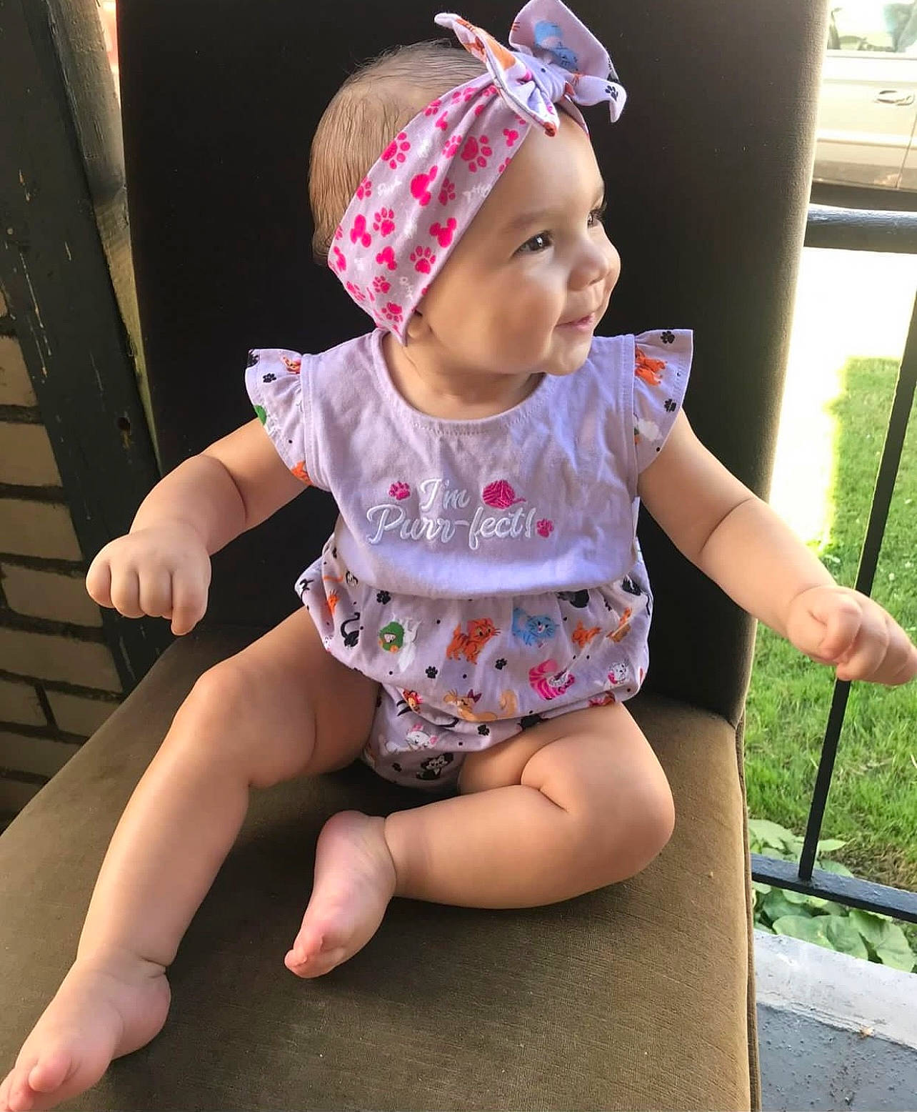 Malaysia is registered to the contest to win money with this photo: baby_toddler_clothing, barefoot, beauty, cap, face, finger, fun, grass, happy, headwear, human_body, human_leg, leg, magenta, neck, person, pink, skin, sleeve, smile