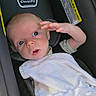 baby, infant, child, car_seat, blanket, white_blanket, portrait, face, wide_eyes, surprised, salute, raised_hand, sitting, vehicle, travel, indoors, 安全, cozy, photography, cute