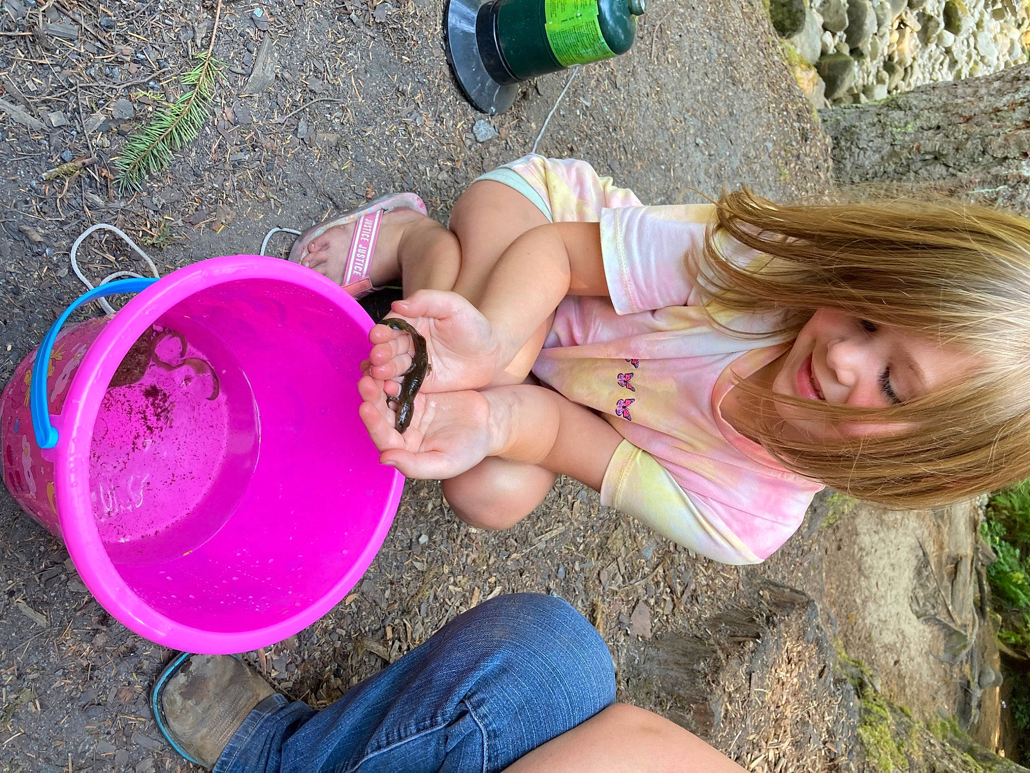 Callie is registered to the contest to win money with this photo: child, foot, fun, grass, green, happy, human_leg, leg, leisure, people_in_nature, person, photograph, pink, plant, play, sand, sitting, soil, summer, thigh