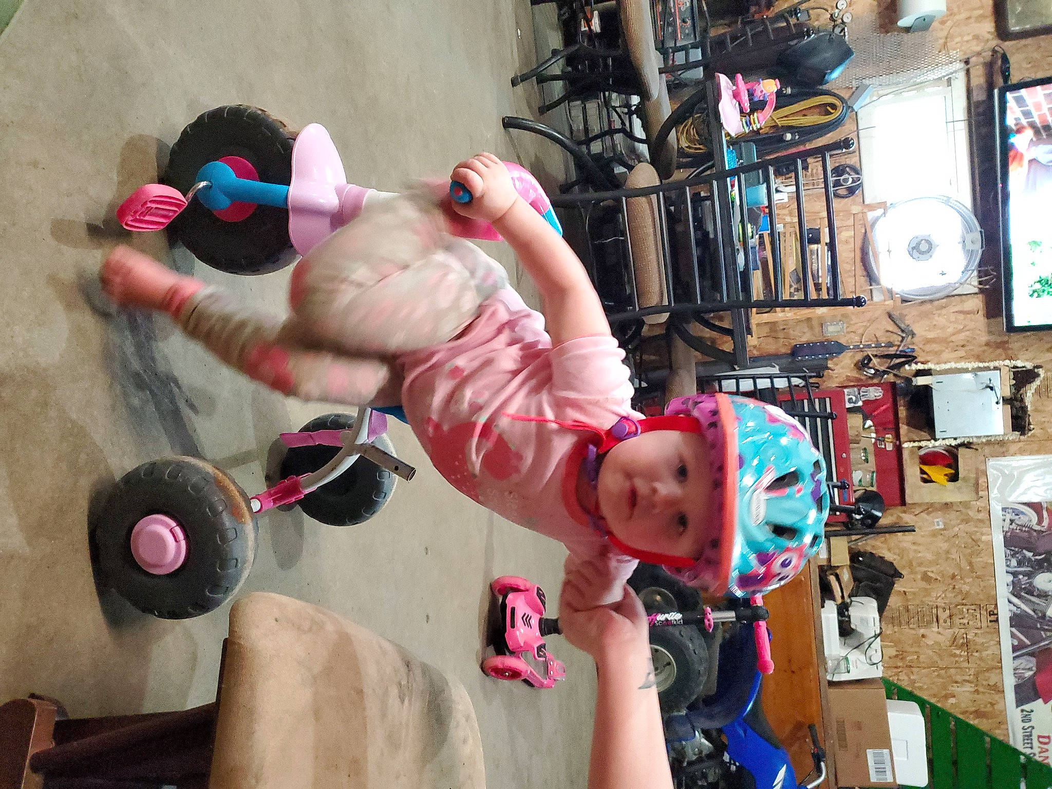 Harmony is registered to the contest to win money with this photo: baby, ball, child, city, eyewear, fun, happy, hat, headwear, helmet, leisure, magenta, person, pink, play, recreation, shorts, t_shirt, tire, toddler