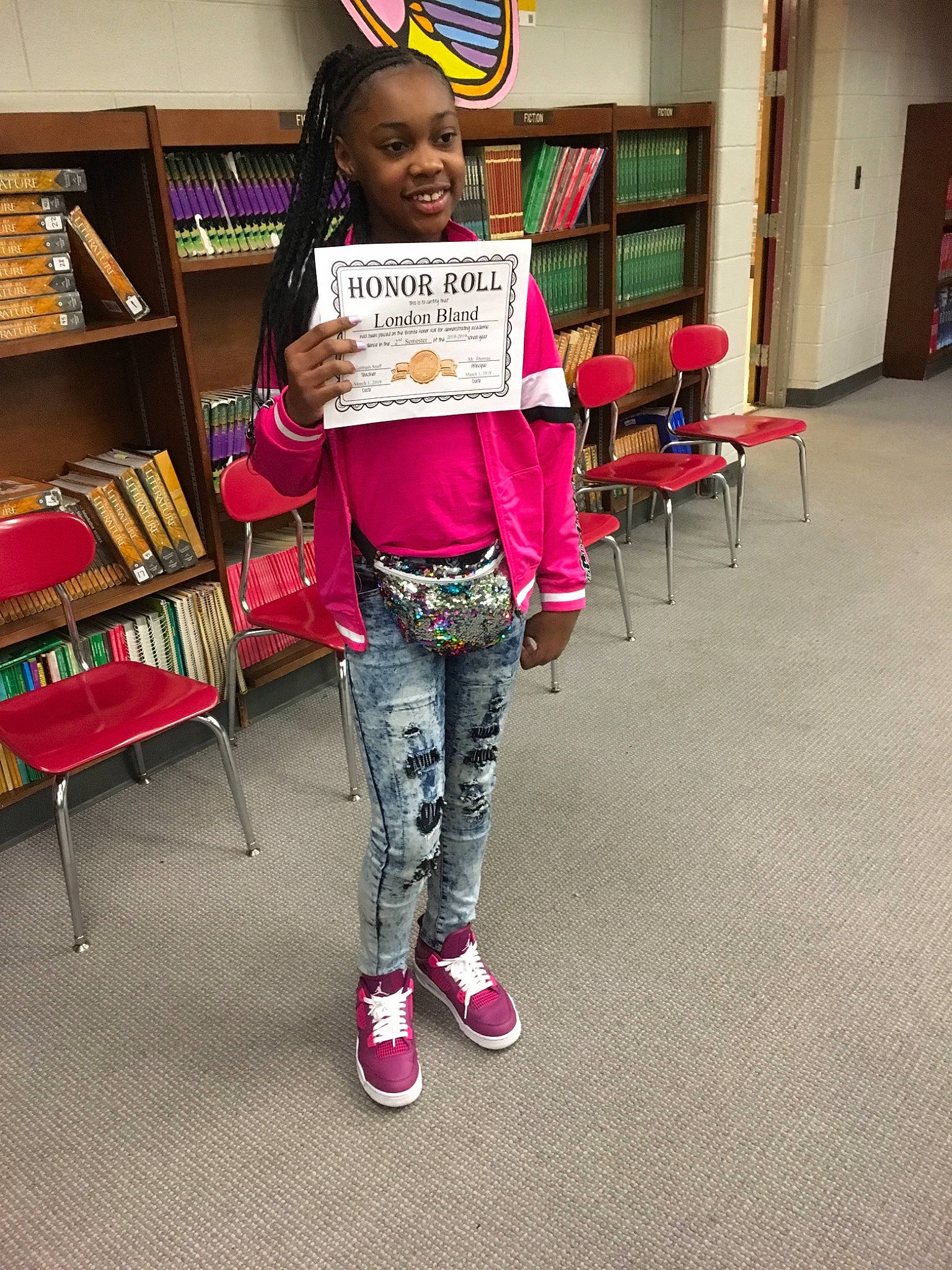 London is registered to the contest to win money with this photo: child, fashion, fashion_accessory, footwear, fun, joint, joy, leg, magenta, person, pink, shoe, smile, snapshot, style, t_shirt, tights