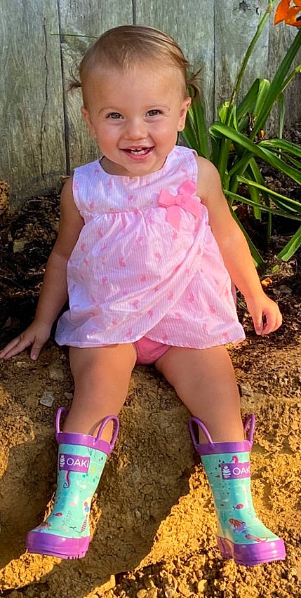 Remi joined the competition — help win amazing prizes! baby, baby_toddler_clothing, boot, calf, child, child_model, dress, footwear, human_leg, joy, knee, leg, person, pink, play, shoe, thigh, toddler