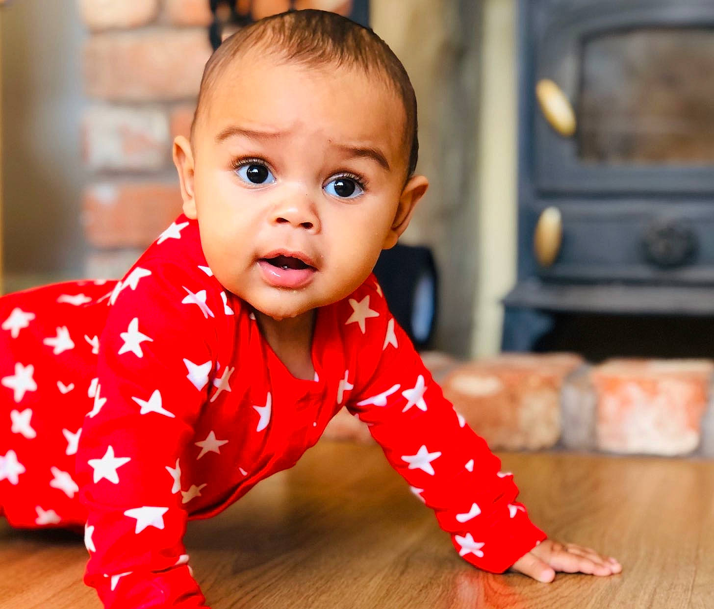 Rico is registered to the contest to win money with this photo: baby, baby_crawling, baby_toddler_clothing, beauty, child, child_model, crawling, flooring, head, lip, outerwear, pattern, person, play, skin, sleeve, surprise, toddler, tummy_time