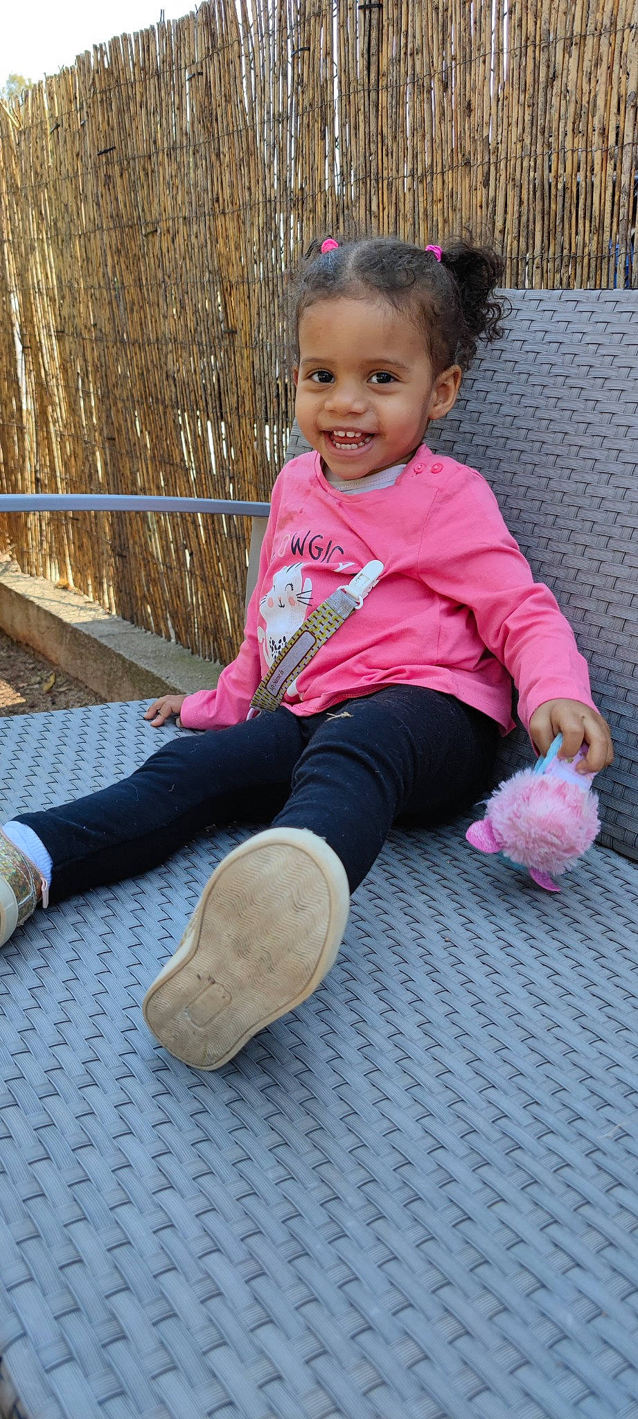 Skyla participe au concours pour gagner de l'argent avec cette photo : baby, baby_toddler_clothing, cheek, child, face, facial_expression, fun, grass, hair, happy, head, joy, person, pink, skin, sleeve, smile, sneakers, sock, toddler