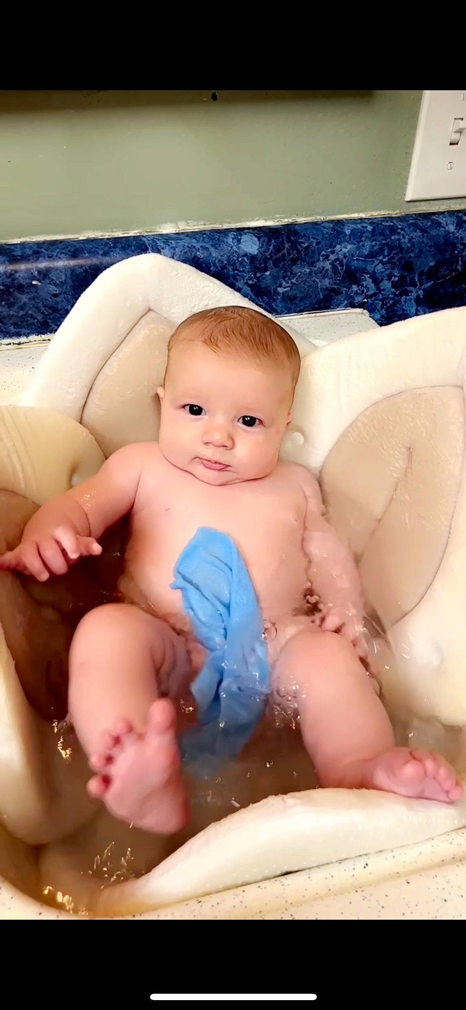 River is registered to the contest to win money with this photo: abdomen, baby, baby_toddler_clothing, blue, cheek, chest, child, comfort, finger, foot, happy, human_leg, leg, mouth, person, pink, skin, stomach, thigh, thumb