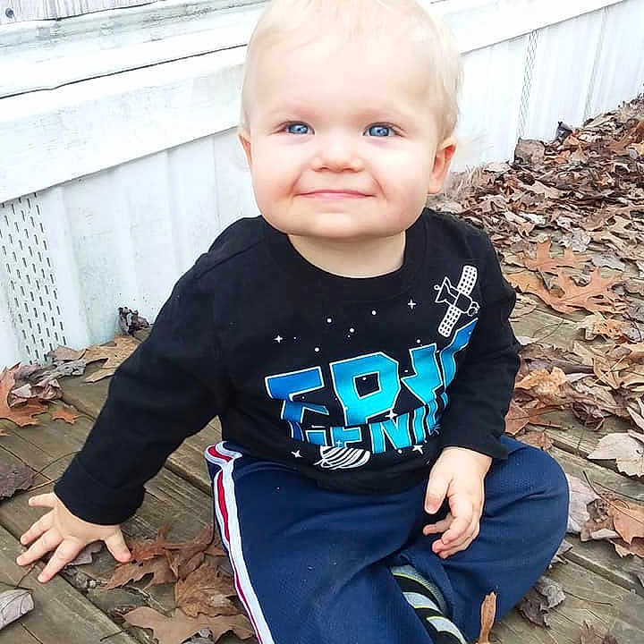 Braylon is registered to the contest to win money with this photo: baby, baby_products, baby_toddler_clothing, child, cool, face, head, joy, people, person, play, sitting, skin, sleeve, smile, t_shirt, toddler, vacation