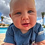 adidas, baby, blue_shirt, child, close_up, clouds, cute, face, happy, infant, outdoor, palm_trees, person, pool, portrait, skin, sky, smile, summer, vacation