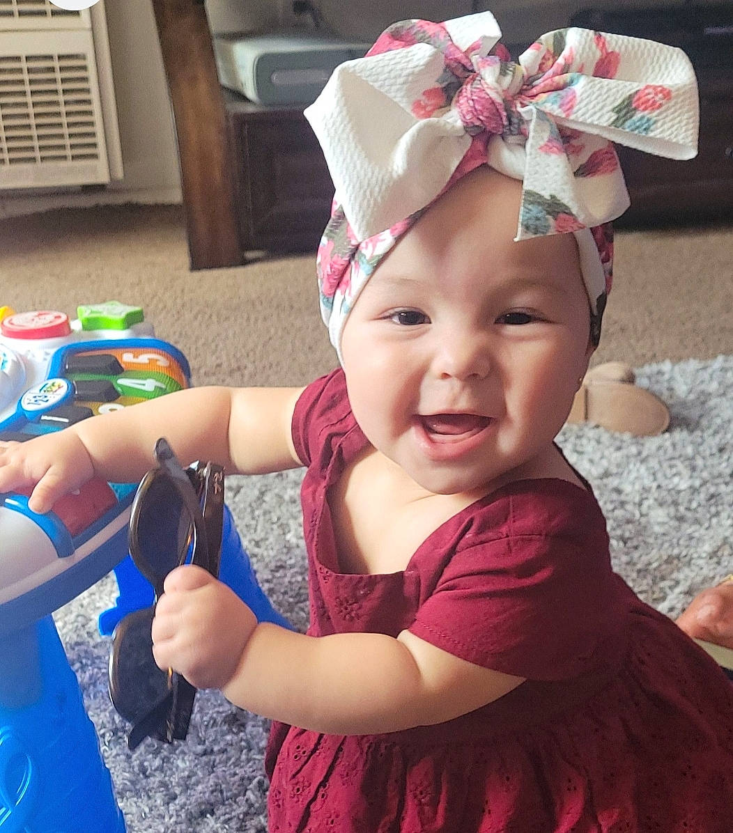 Saylena joined the competition — help win amazing prizes! baby, baby_toddler_clothing, cap, child, cool, costume_hat, fashion_accessory, fun, hair_accessory, happy, headband, headpiece, headwear, magenta, person, pink, purple, smile, summer, toddler