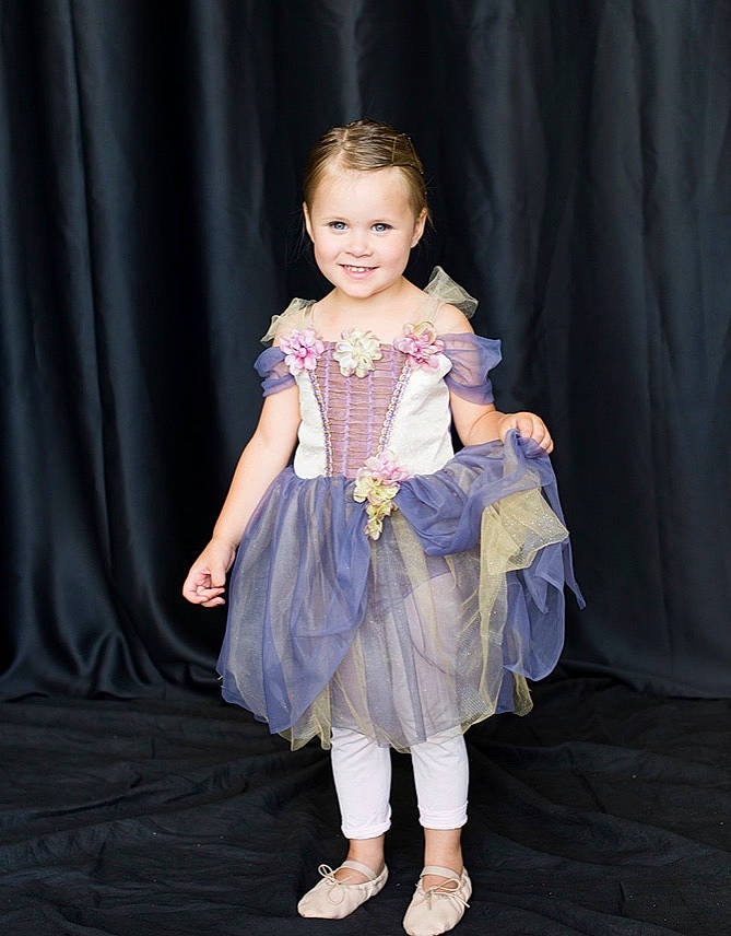 Annalee is registered to the contest to win money with this photo: blue, child, child_model, clothing, costume, dance, dress, event, joy, performance, performing_arts, person, photography, purple, smile, toddler