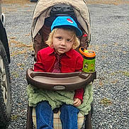 Raiden joined the competition — help win amazing prizes! child, toddler, stroller, graco_stroller, sippy_cup, blue_cap, red_shirt, necktie, sneakers, gravel, parking_lot, car, blanket, outdoor, overcast_sky, trees, hills, mountain, portrait, cup_holder