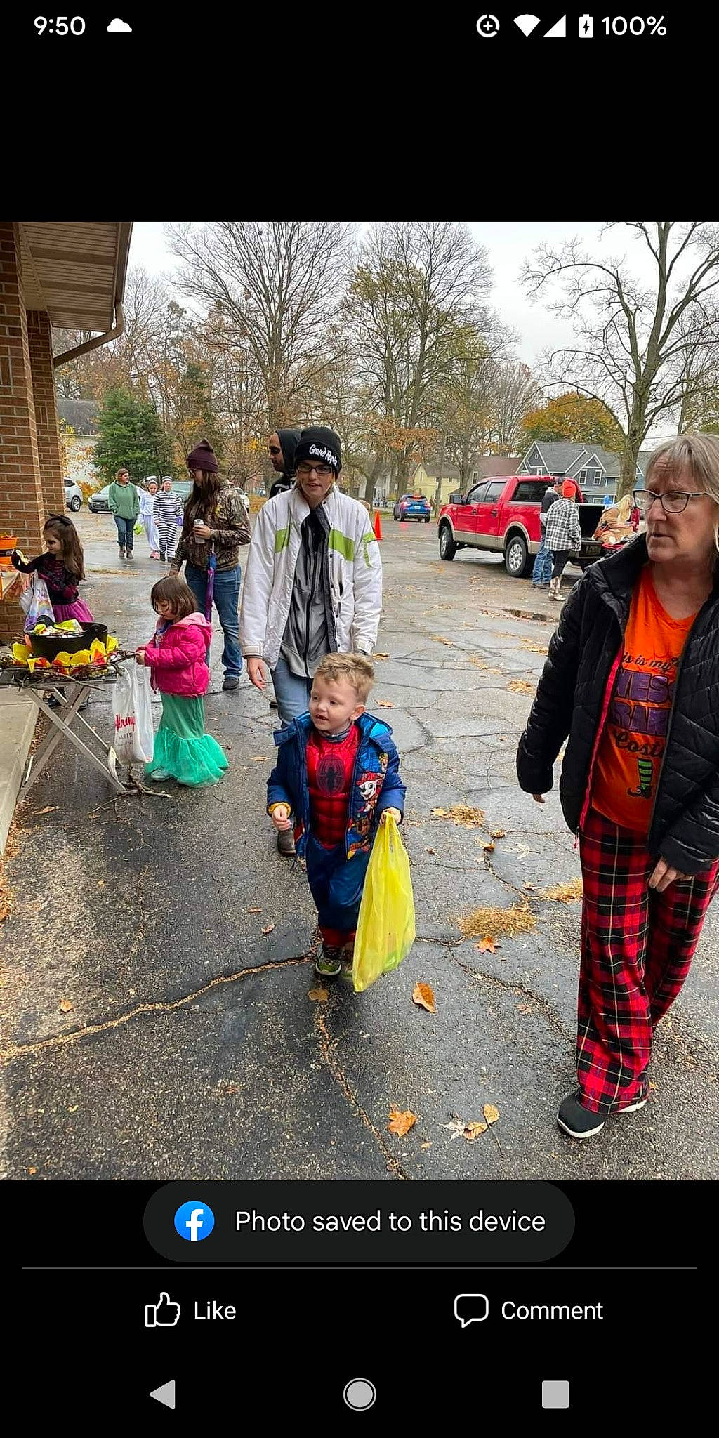 Michael is registered to the contest to win money with this photo: asphalt, car, city, event, fun, headwear, jacket, leisure, morning, pedestrian, person, photograph, plaid, recreation, road, sky, snapshot, tartan, toddler, travel