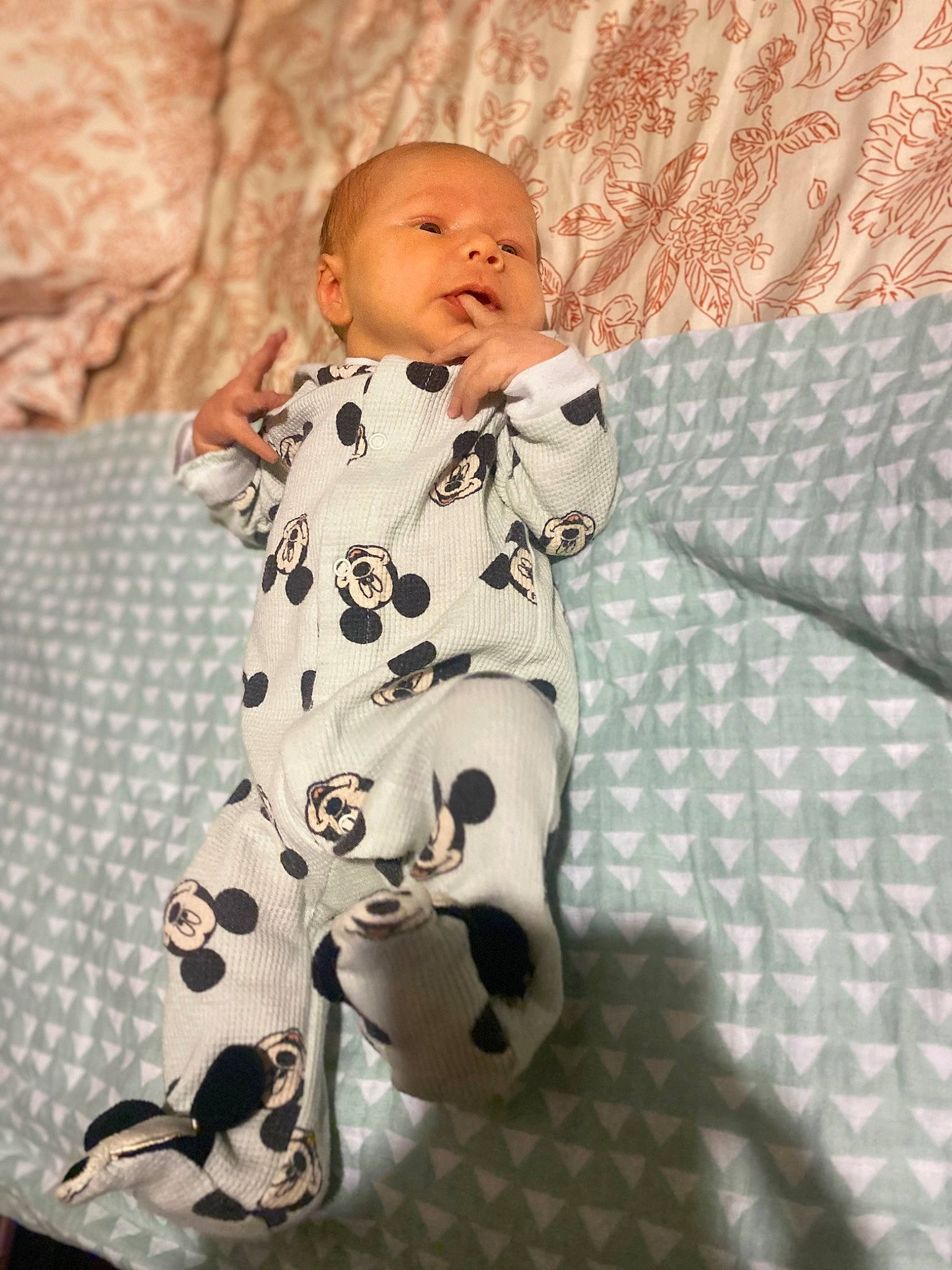 Tristian is registered to the contest to win money with this photo: baby, baby_toddler_clothing, carmine, child, comfort, flooring, fun, happy, linens, pattern, person, room, sitting, sleeve, toddler, wood