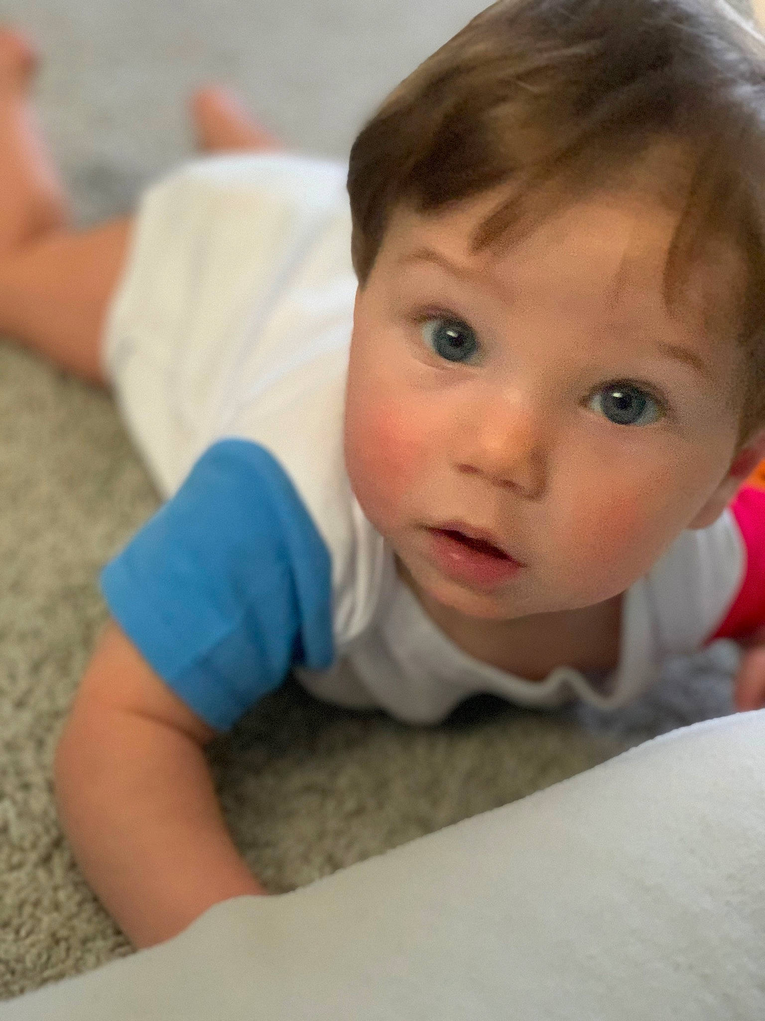 Kaycen joined the competition — help win amazing prizes! baby, baby_toddler_clothing, cheek, child, comfort, eyebrow, eyelash, finger, floor, flooring, happy, linens, mouth, nose, person, sitting, skin, sleeve, smile, surprise