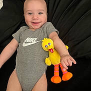 Amiri joined the competition — help win amazing prizes! baby, bodypart, clothing, couch, cushion, face, finger, furniture, hand, happy, head, homedecor, person, photography, plush, portrait, sitting, smile, t_shirt, toy