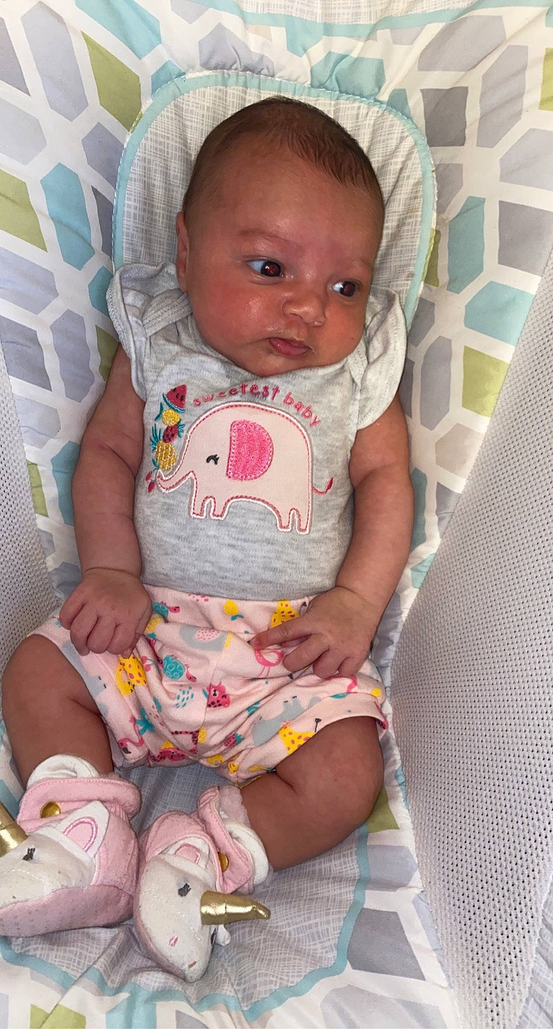 Kaylynn joined the competition — help win amazing prizes! baby, baby_products, baby_toddler_clothing, chair, cheek, child, comfort, foot, fun, iris, lap, linens, pattern, person, pink, room, sitting, skin, textile, toddler