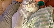 Jaxon joined the competition — help win amazing prizes! arm, baby, bed, blanket, child, closeup, comfort, cuddle, fabric, indoor, infant, napping, pacifier, person, relaxation, resting, skin, sleepwear, soft, striped