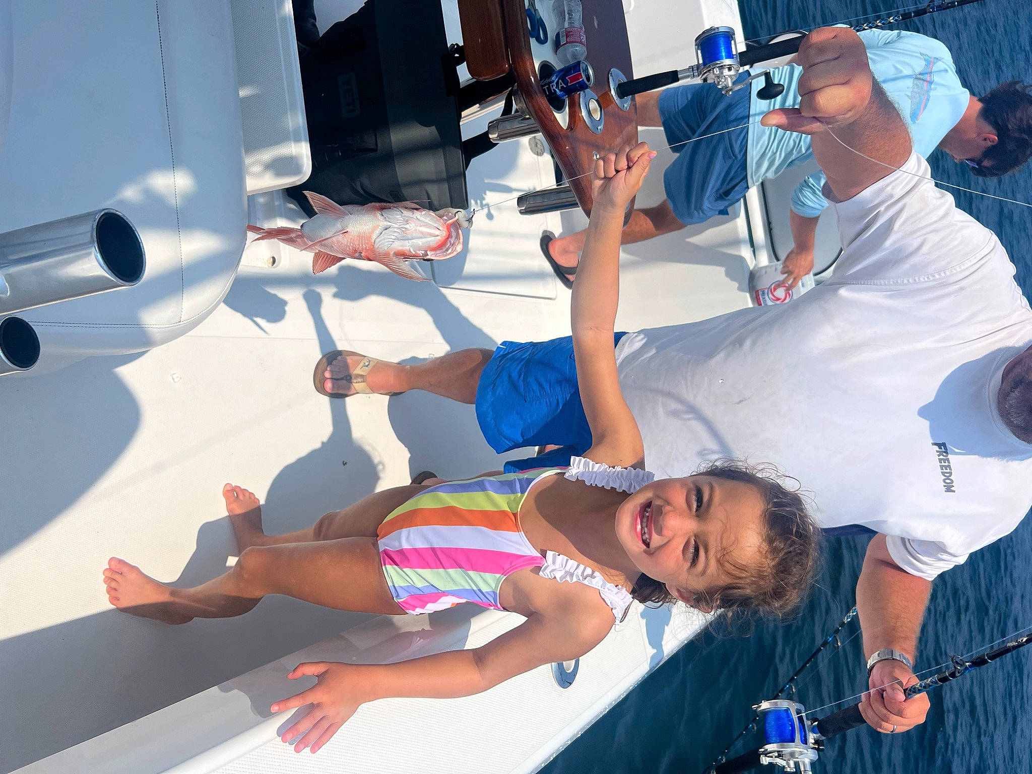 Camden is registered to the contest to win money with this photo: boat, elbow, event, fun, hat, human_leg, joy, knee, leg, leisure, muscle, naval_architecture, person, recreation, shorts, smile, t_shirt, thigh, transport, vacation