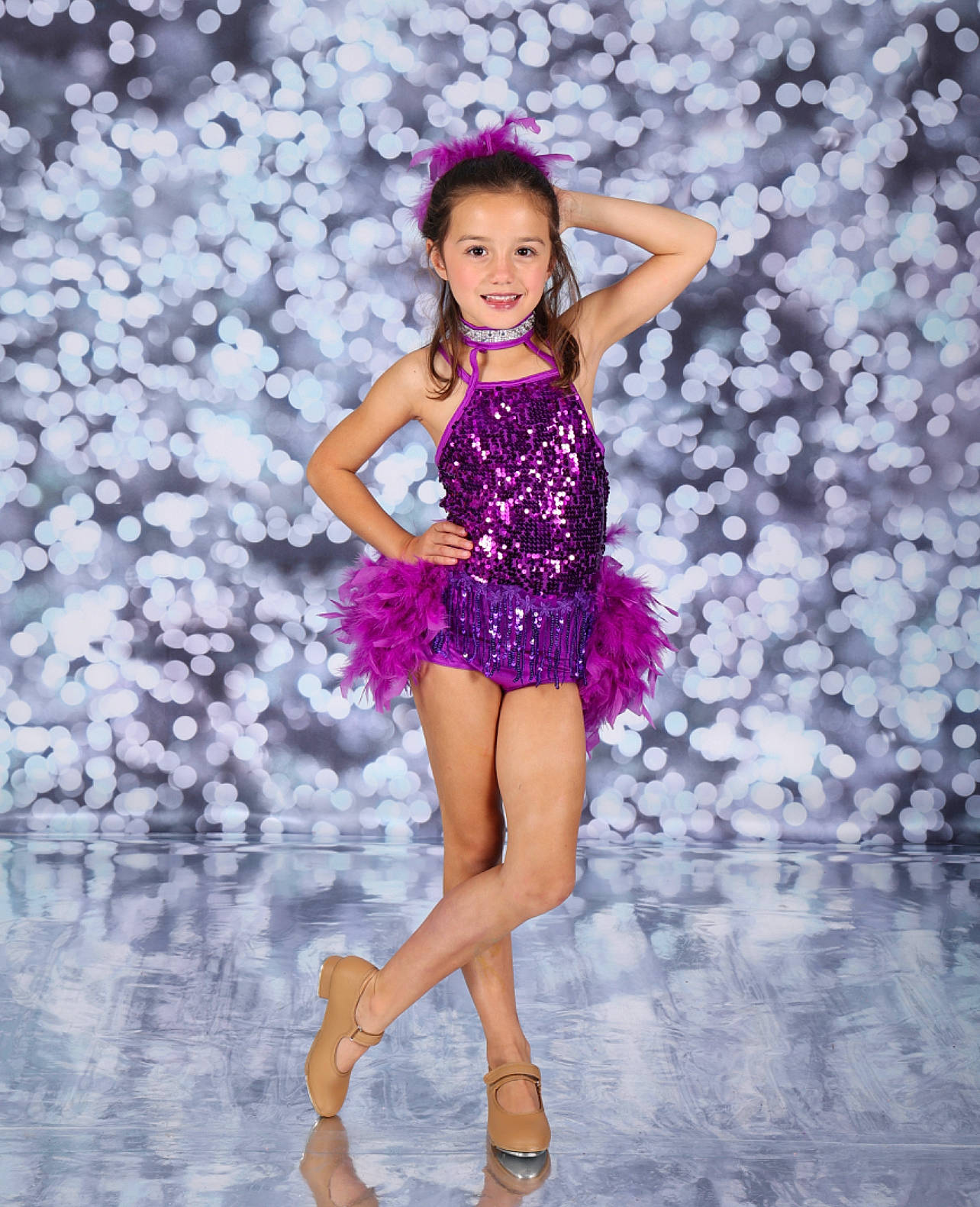 Camden is registered to the contest to win money with this photo: arm, day_dress, dress, entertainment, eye, fashion_design, flash_photography, hair, happy, head, human_body, joy, leg, one_piece_garment, performing_arts, person, pink, purple, smile, thigh