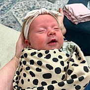 Hallie joined the competition — help win amazing prizes! baby, blanket, childbirth, crying, face, head, newborn, person, photography, portrait, sad, sleeping, yawning