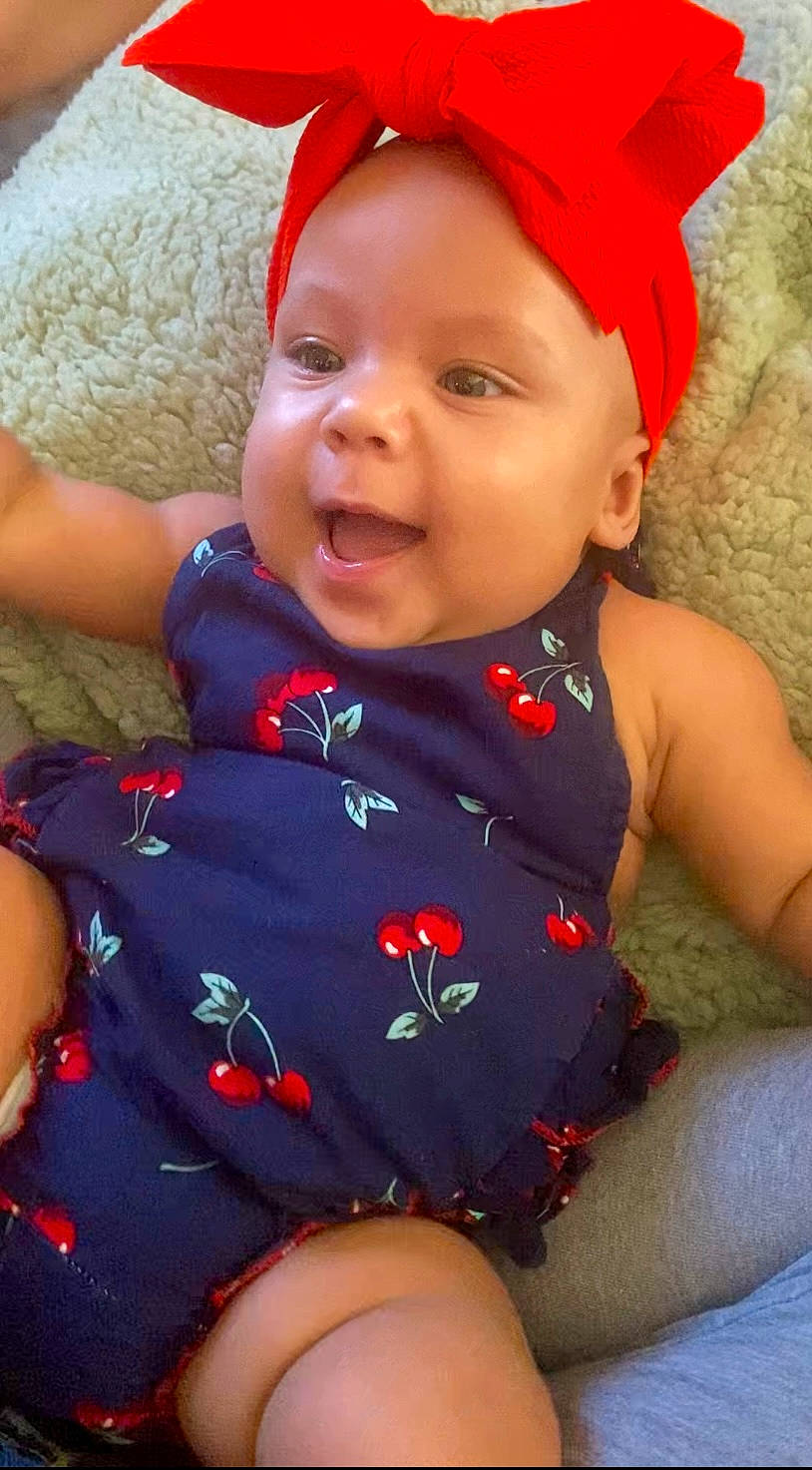 Serenity joined the competition — help win amazing prizes! baby_toddler_clothing, cap, cheek, chin, eye, face, facial_expression, hairstyle, happy, head, headwear, human_body, lip, mouth, nose, orange, organ, person, pink, skin