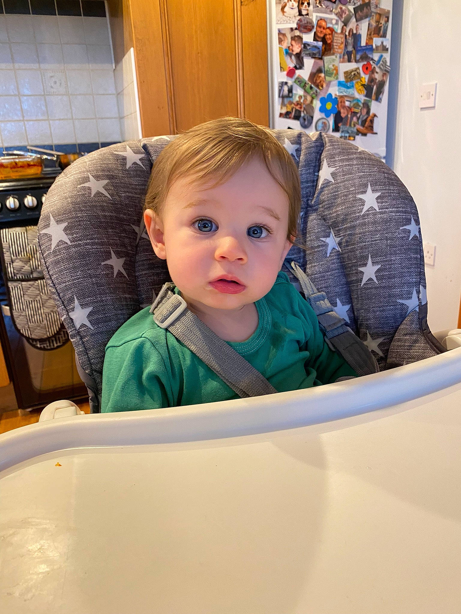 Franklin is registered to the contest to win money with this photo: baby, baby_toddler_clothing, chair, cheek, child, chin, comfort, flooring, fun, happy, leisure, person, picture_frame, play, room, sitting, sleeve, surprise, t_shirt, toddler