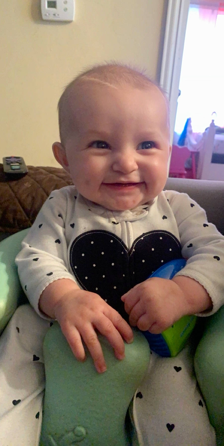 Emmalyn joined the competition — help win amazing prizes! baby, baby_toddler_clothing, cheek, child, eye, face, facial_expression, finger, forehead, head, joy, lip, mouth, person, play, sitting, skin, smile, thumb, toddler