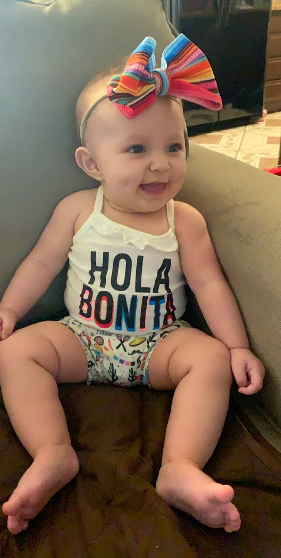 Emmalyn is registered to the contest to win money with this photo: baby, baby_toddler_clothing, child, headgear, joy, leg, person, sitting, thigh, toddler