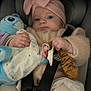 Léana participe au concours pour gagner de l'argent avec cette photo : baby, child, car_seat, seatbelt, headband, pink, plush_toy, pacifier, knitwear, cute, infant, clothing, holding, toddler, indoor, portrait, sitting, soft_toys, warm_clothing, baby_accessories