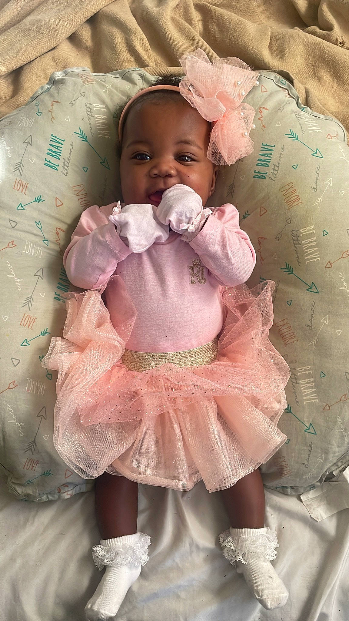 Naiomi joined the competition — help win amazing prizes! baby, baby_toddler_clothing, cheek, child, comfort, dress, face, happy, head, headgear, iris, pattern, person, pink, product, ruffle, skin, sleeve, textile, toddler