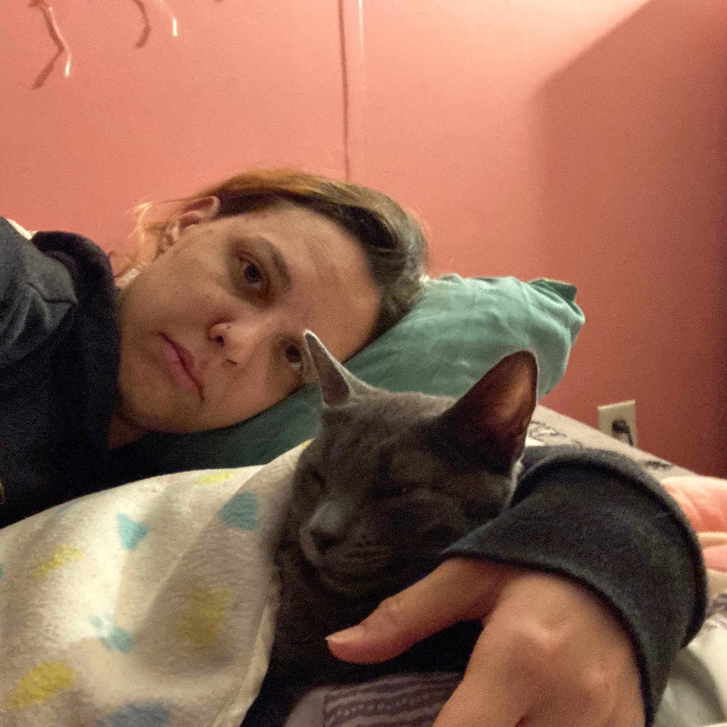 Willow is registered to the contest to win money with this photo: adult, animal, baby, bed, bedroom, blanket, cat, cushion, face, female, furniture, head, homedecor, indoors, person, pet, photography, portrait, room, woman