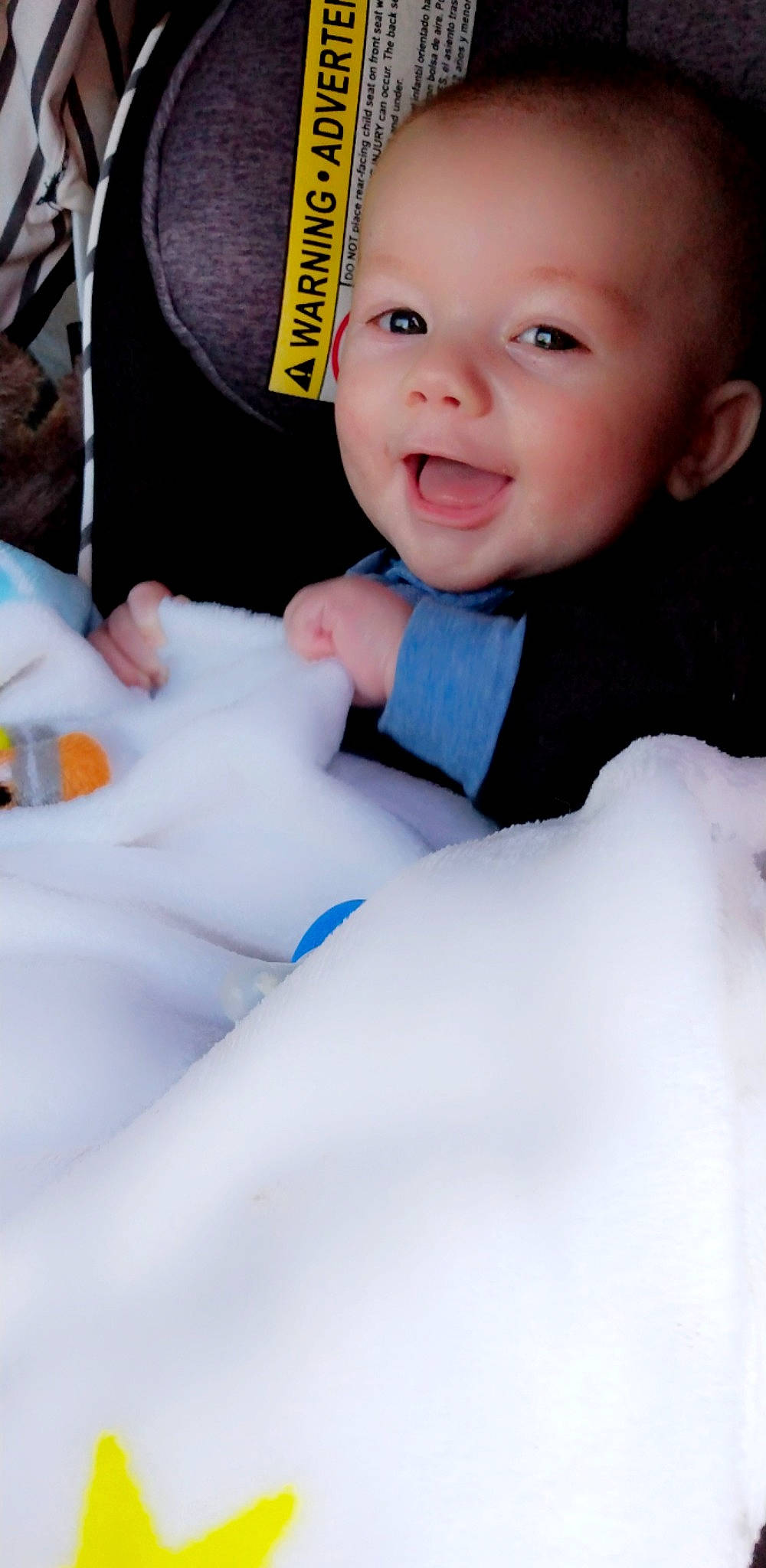 Jenson joined the competition — help win amazing prizes! baby, baby_products, baby_toddler_clothing, cap, cheek, child, electric_blue, finger, flash_photography, fun, happy, human, jacket, nose, person, product, sitting, skin, smile, toddler