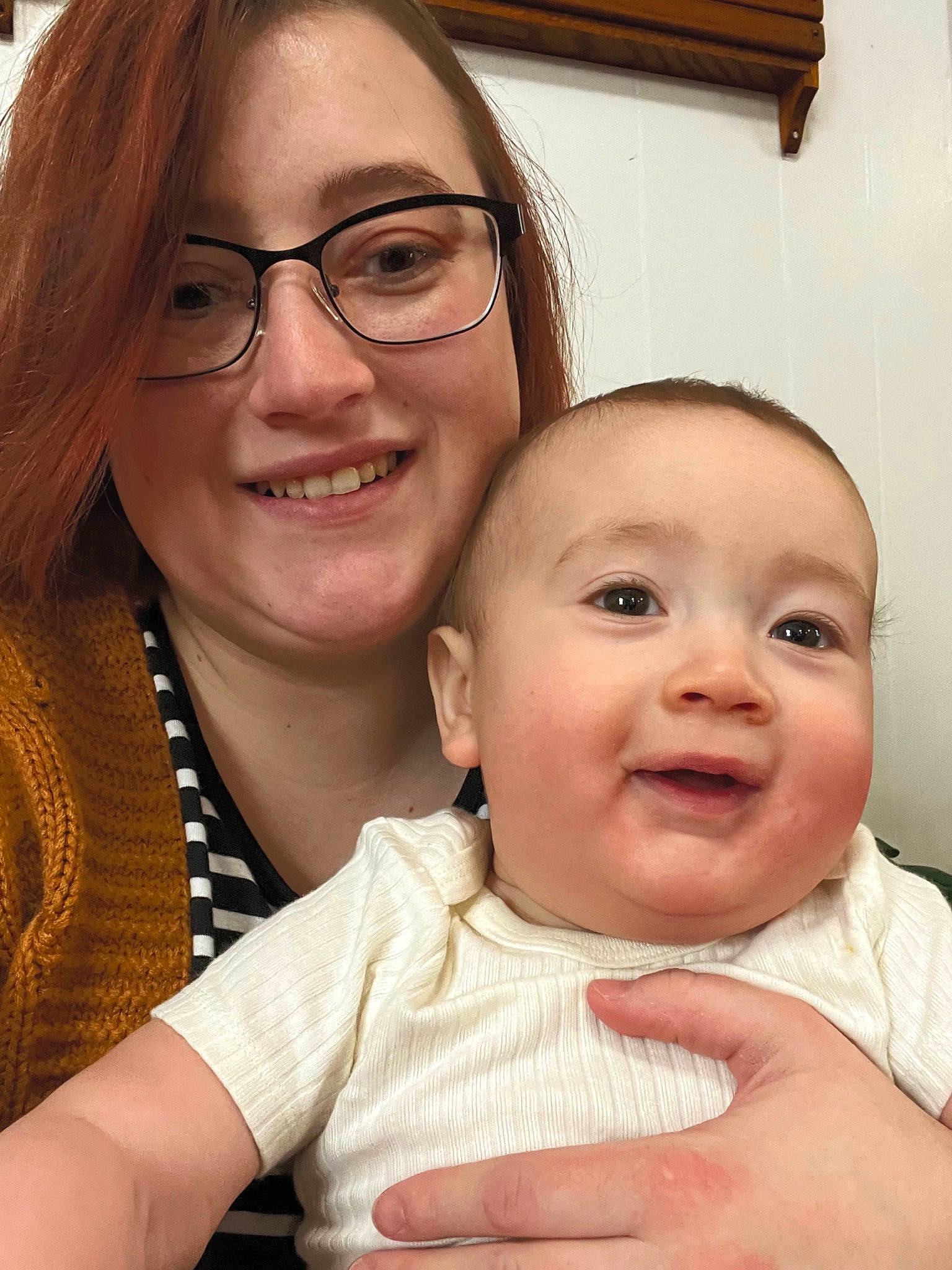 Dakota is registered to the contest to win money with this photo: baby, cheek, chin, eye, eyebrow, eyewear, face, facial_expression, gesture, glasses, happy, head, iris, joy, lip, mouth, nose, person, skin, smile