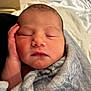 Nora is registered to the contest to win money with this photo: newborn, baby, sleeping, blanket, hand, face, infant, wrapped, soft, peaceful, closeup, skin, cute, resting, portrait, indoors, newborn_baby, child, toddler, cozy