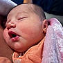 Nora is registered to the contest to win money with this photo: newborn, baby, sleeping, closeup, face, blanket, pink, soft, infant, peaceful, child, wrapped, mouth, skin, portrait, cozy, cute, young, rest, toddler
