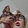 dog, person, glasses, indoor, ceiling, blond_hair, face, close_up, looking_up, pet, animal, curious, casual, expression, portrait, head, brown_dog, white_background, human, companion