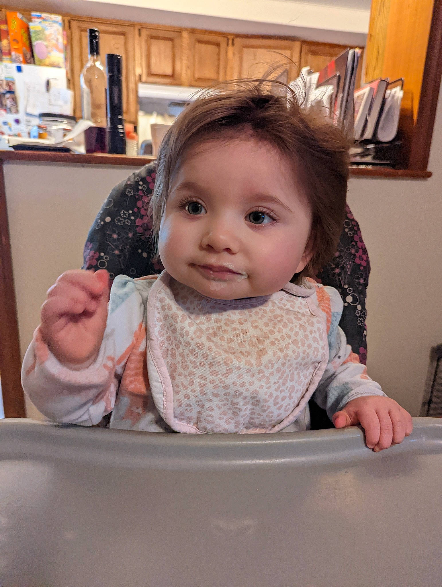 Abigail joined the competition — help win amazing prizes! baby, baby_toddler_clothing, bib, cheek, child, dishware, eyebrow, flooring, fun, happy, iris, nose, person, picture_frame, shelf, sitting, skin, sleeve, table, toddler