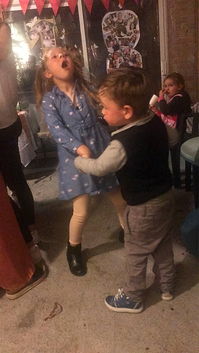 Noëhlya participe au concours pour gagner de l'argent avec cette photo : boot, child, event, fashion_design, flooring, footwear, formal_wear, fun, human_leg, interaction, leg, leisure, person, sandal, shoe, sneakers, social_group, standing, toddler, tree