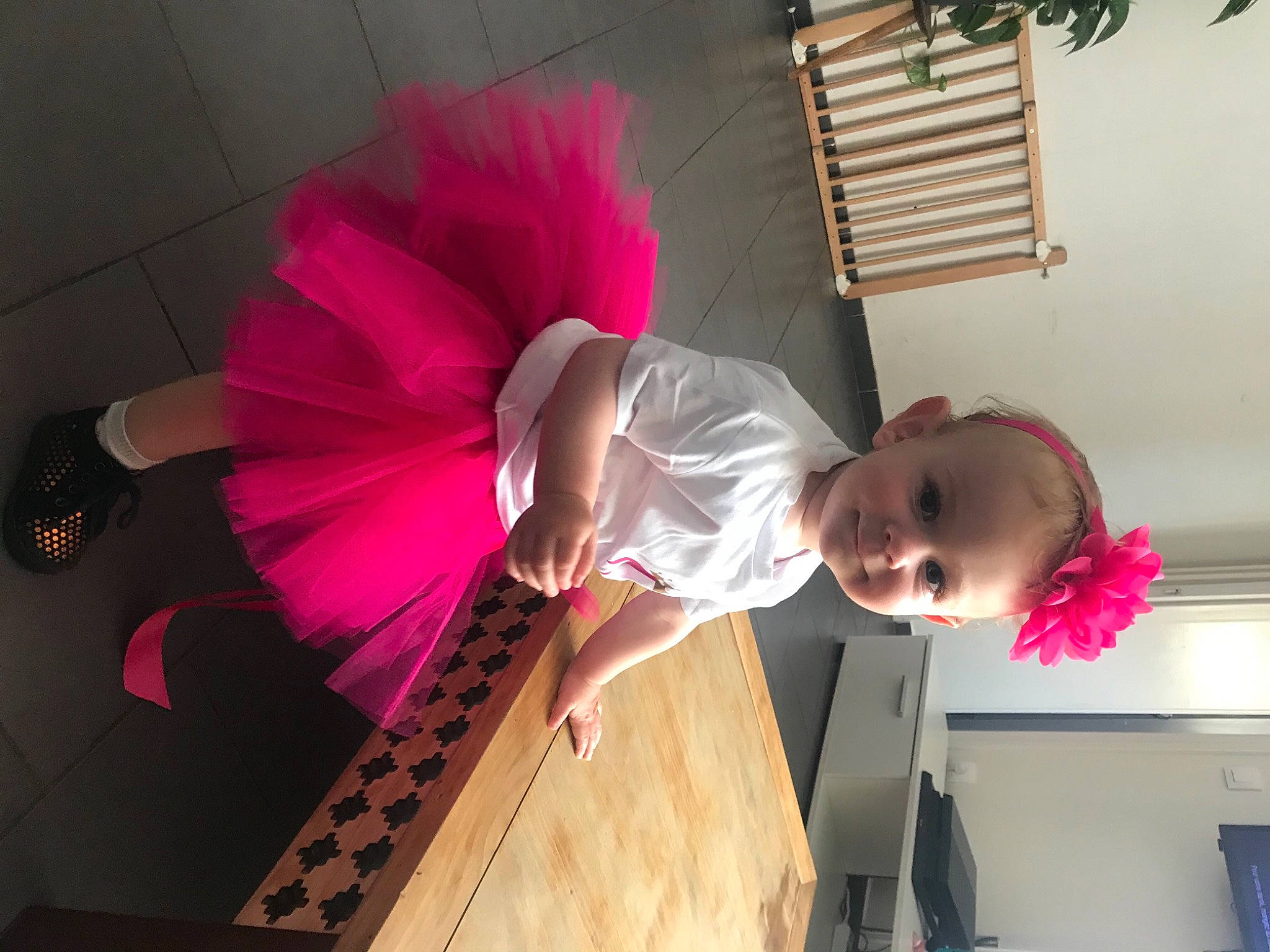 Noëhlya a rejoint le concours — aidez-le/la à gagner de superbes lots ! child, dress, fashion, fashion_design, flooring, fun, happy, hardwood, human_leg, joy, leisure, magenta, pattern, person, pink, purple, room, smile, toddler, waist