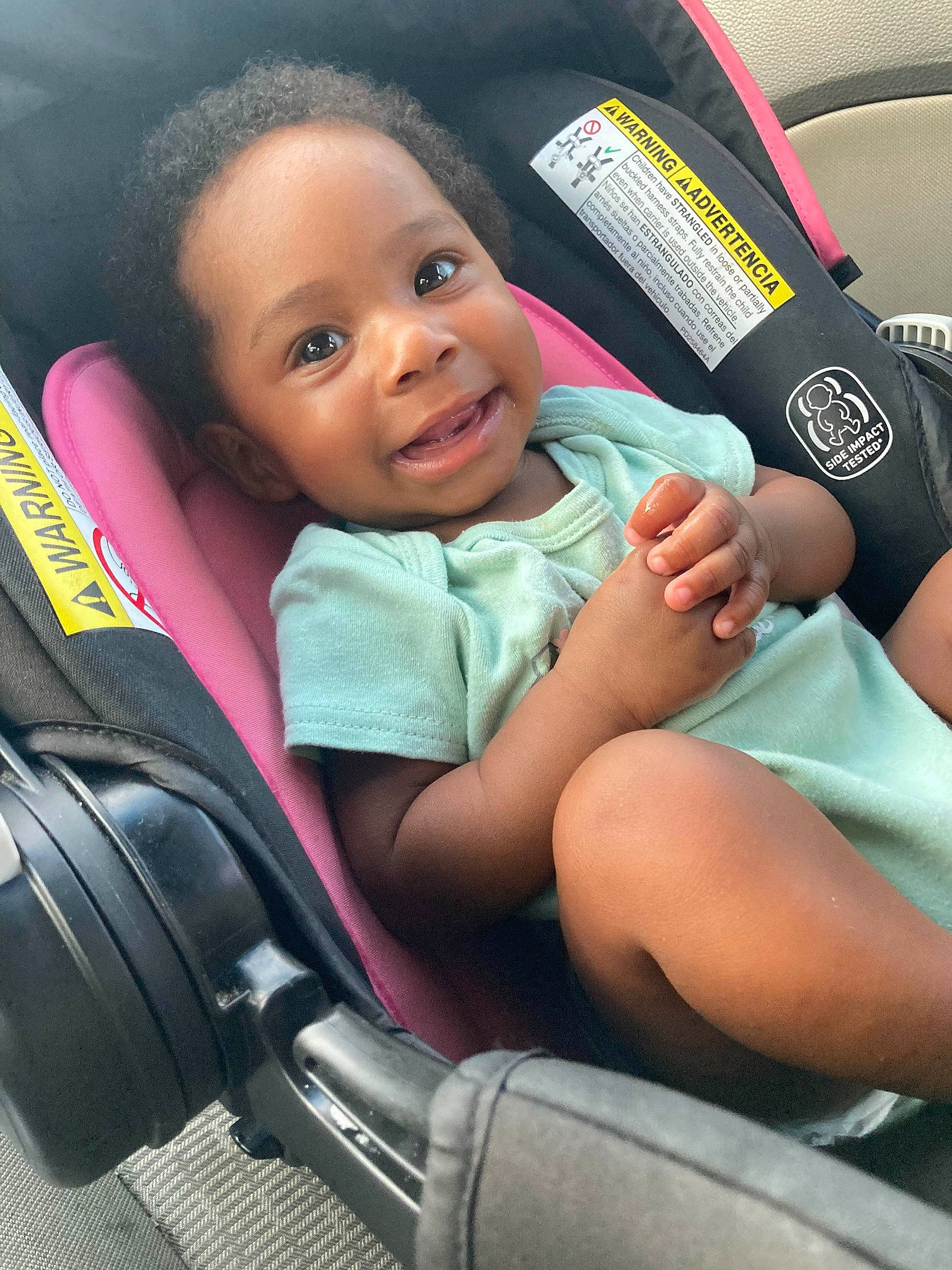 Natalia is registered to the contest to win money with this photo: auto_part, automotive_design, baby, baby_carriage, baby_in_car_seat, car_seat, car_seat_cover, child, comfort, face, happy, head, head_restraint, joy, motor_vehicle, person, product, seat_belt, smile, thigh