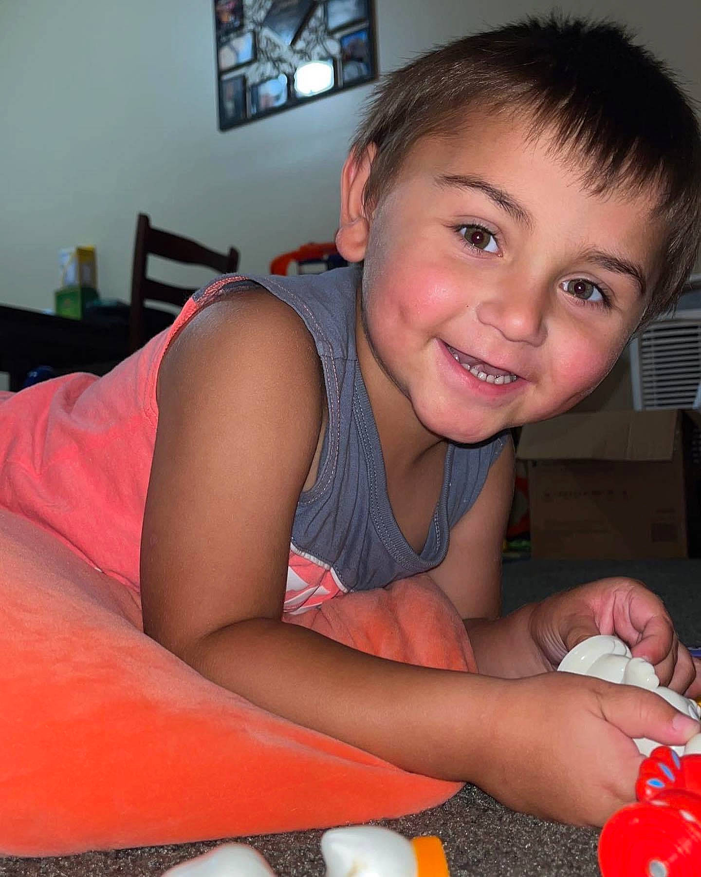 Skyler joined the competition — help win amazing prizes! cheek, child, elbow, flooring, fun, happy, human_body, human_leg, iris, joy, lap, mammal, mouth, nose, person, picture_frame, sitting, skin, smile, thigh