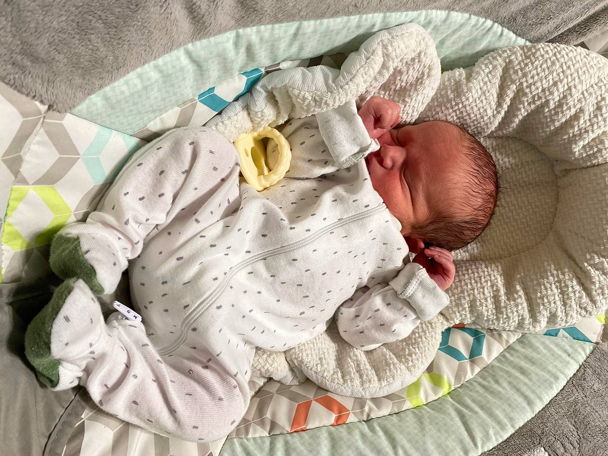 Hunter is registered to the contest to win money with this photo: baby, baby_products, baby_safety, baby_sleeping, baby_toddler_clothing, baby_toys, bedding, bedtime, child, comfort, hand, head, infant_bed, linens, nap, pattern, person, sleep, sleeve, textile