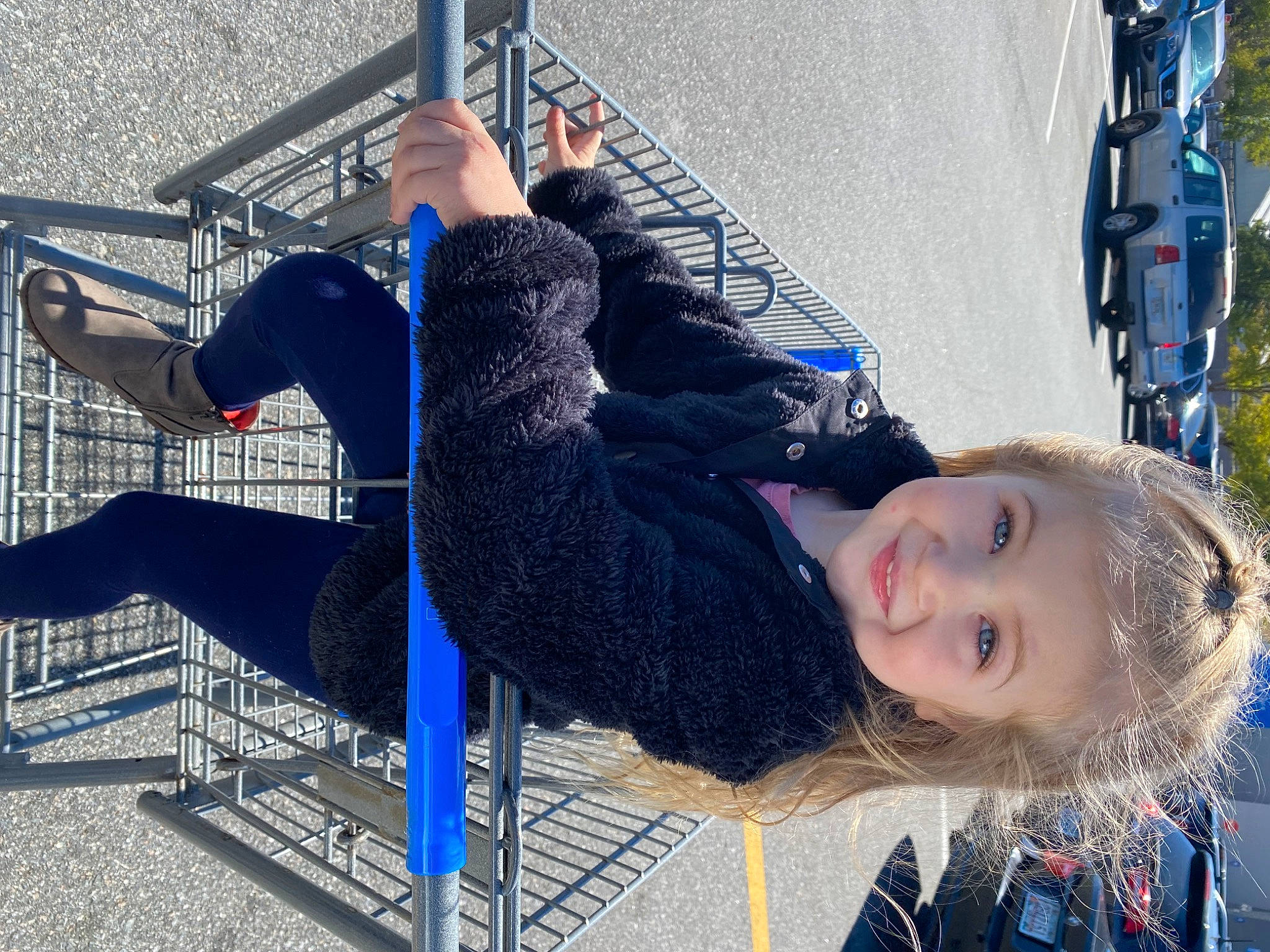 Malia is registered to the contest to win money with this photo: blue, car, denim, electric_blue, foot, fun, happy, human_leg, joy, leisure, pattern, person, recreation, sitting, smile, thigh, thread, toddler, travel, vacation