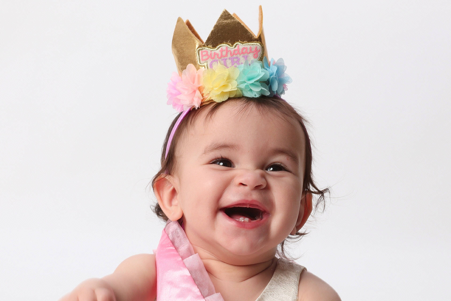Gabriela is registered to the contest to win money with this photo: baby, baby_toddler_clothing, cap, costume_hat, ear, event, eyelash, gesture, hair_accessory, happy, headband, headgear, headpiece, jewellery, joy, magenta, party_supply, person, pink, smile