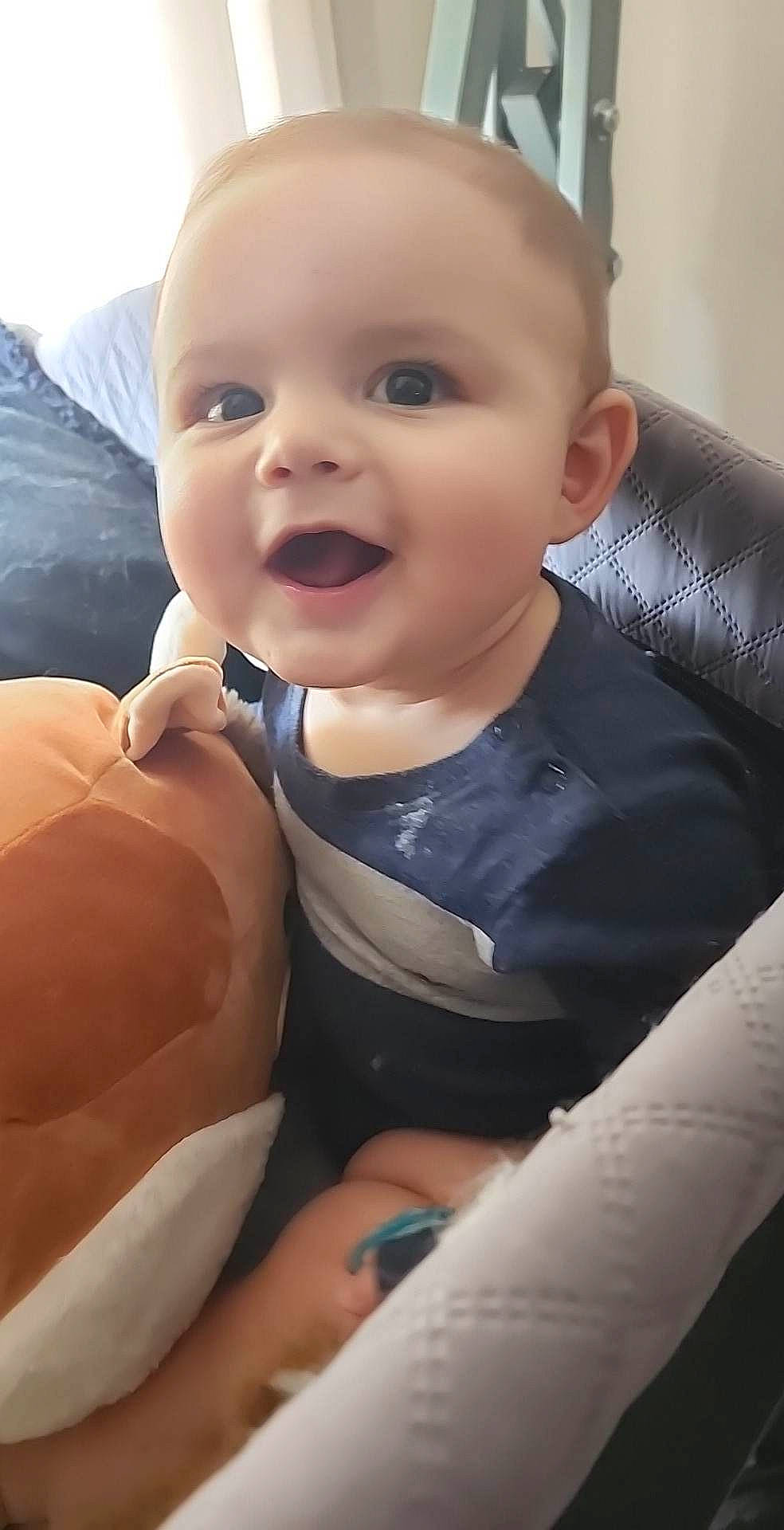 Lincoln joined the competition — help win amazing prizes! baby, baby_laughing, baby_toddler_clothing, cheek, child, comfort, eye, eyebrow, facial_expression, finger, gesture, happy, iris, lip, neck, nose, person, skin, sleeve, smile