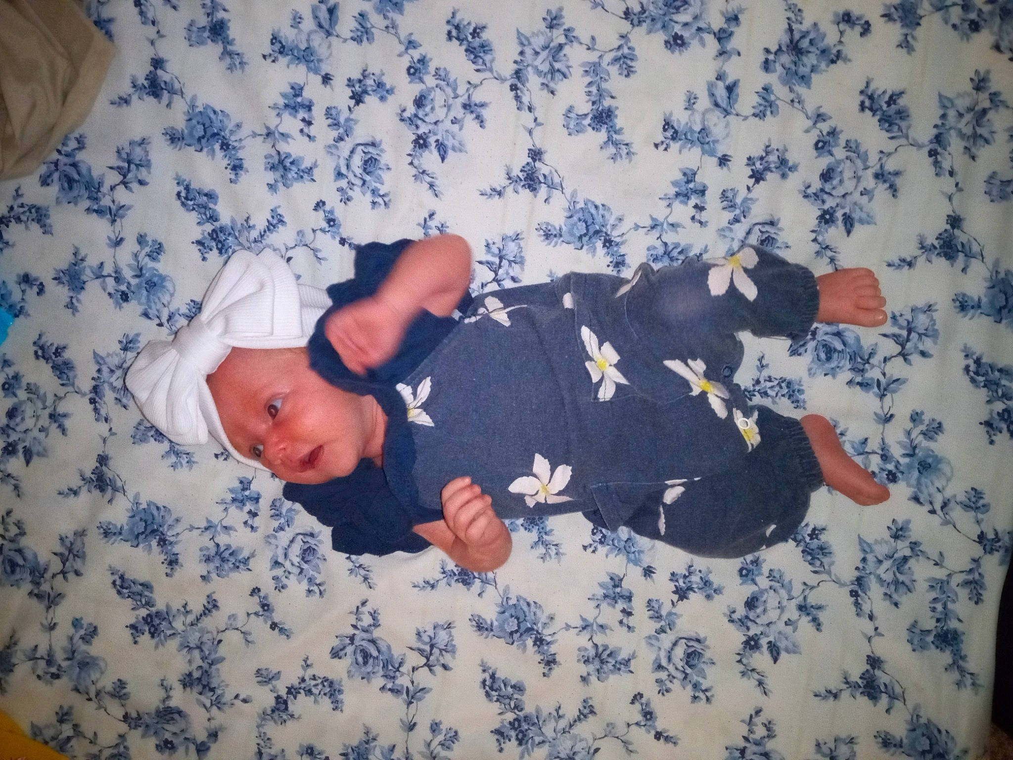 Alaina is registered to the contest to win money with this photo: azure, baby, baby_toddler_clothing, child, cloud, comfort, finger, flooring, foot, human_leg, linens, pattern, person, room, sitting, sleeve, sock, t_shirt, thigh, toddler