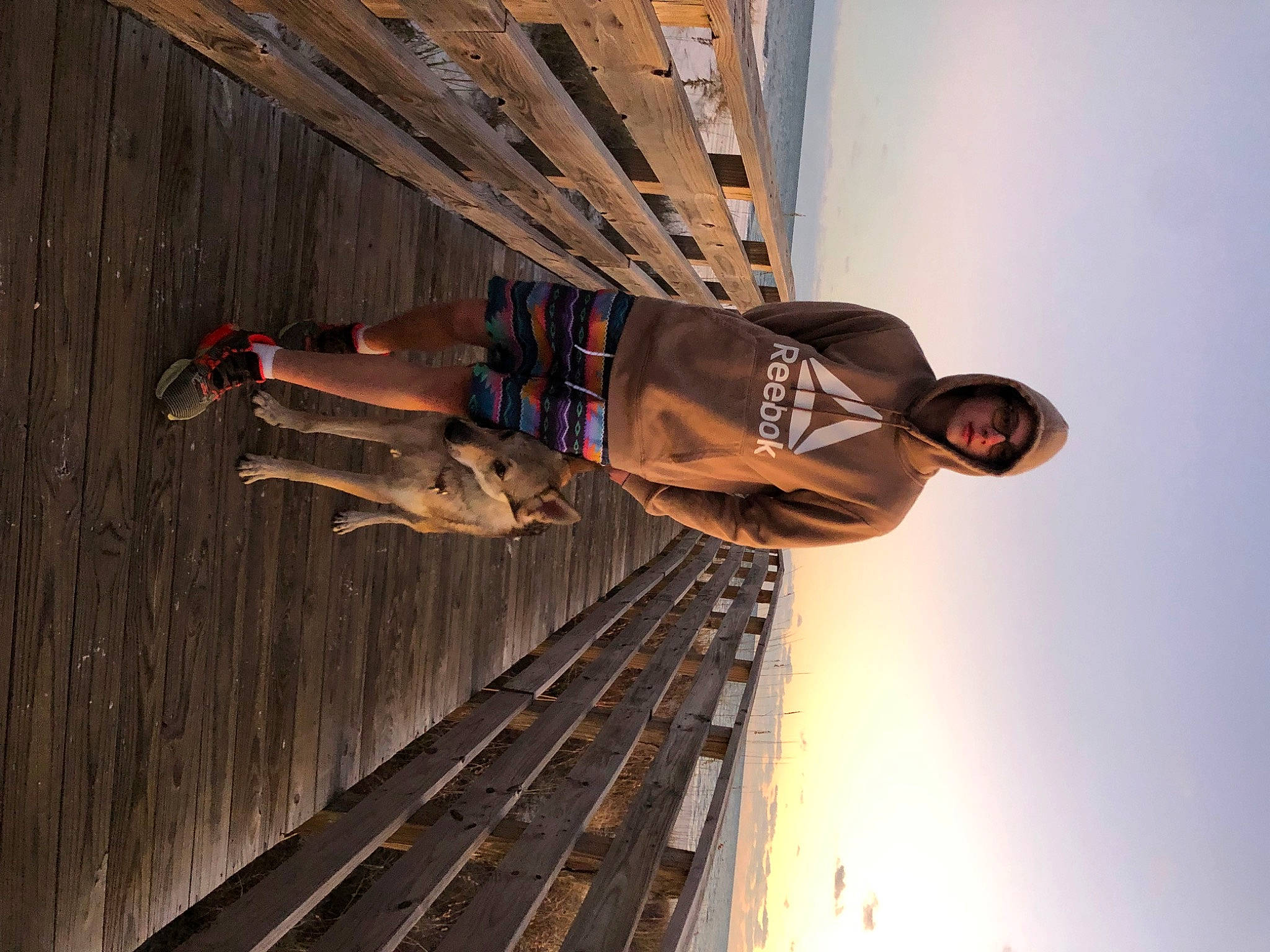 Thor is registered to the contest to win money with this photo: adventure, building, ceiling, climbing, cloud, concrete, facade, hardwood, human_body, metal, outdoor_shoe, recreation, rolling, shadow, sky, smile, sport_climbing, track, wood, wood_stain